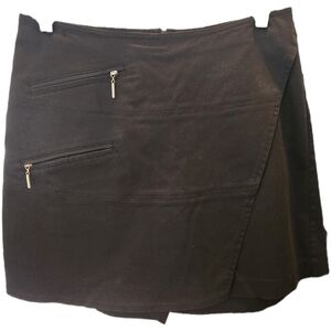 Jamie Sadock black golf skirt with multiple pockets